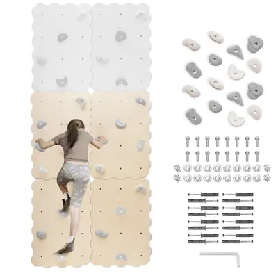A child is climbing on a modular climbing wall set up indoors. The set includes climbing holds and mounting hardware.