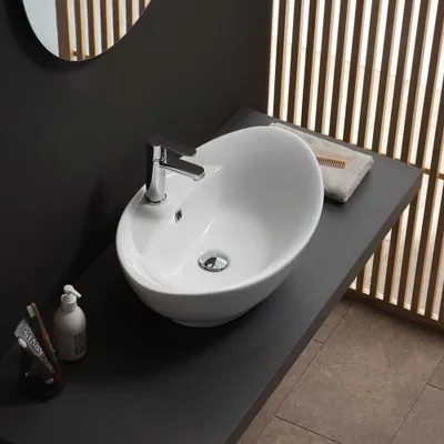 Immagine prodotto di Lavabo da appoggio ovale in Vetroceramica bianca