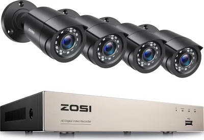 A set of four black security cameras and a silver DVR unit.