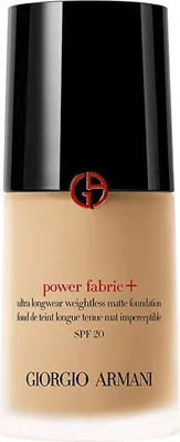 A close-up studio shot of a bottle of Giorgio Armani Power Fabric+ foundation.