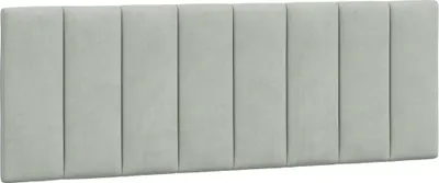 A headboard cushion with vertical stitching.