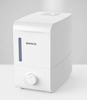 A white BONECO humidifier is shown against a light gray and white background.