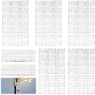 Productafbeelding van 100 Transparante lichtkettingclips voor kerstdecoratie - Set van 120 mini-plakstrips - Zelfklevende haken - Geschikt voor feestverlichting - Geen boren nodig