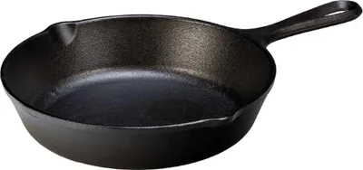 A black cast iron frying pan is shown from a slightly elevated side angle against a white background.