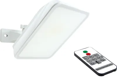 A white LED floodlight with a remote control on a white background.