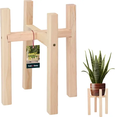 A wooden plant stand and a potted snake plant are shown against a white background.