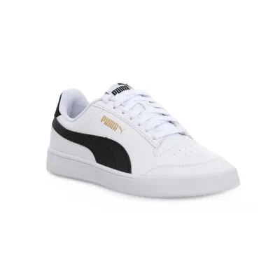 A white Puma sneaker with black and gold accents is shown from a side angle against a white background.