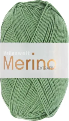 A ball of green yarn with a white label.