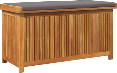 A wooden outdoor storage box with a gray cushion on top, shown against a white background.