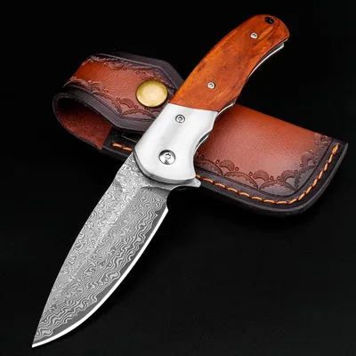 Image de Couteau pliant en acier damas VG10, 77 couches, manche en bois, système de verrouillage liner lock, clip de ceinture, étui en cuir, boîte cadeau