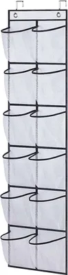 A white hanging shoe organizer with 12 pockets against a white background.