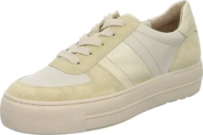 A single beige sneaker is shown from a side angle against a white background.