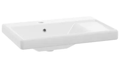 A white ceramic sink with a built-in soap dish area, shown from a slightly elevated side angle against a white background.
