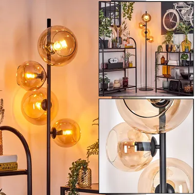 Produktbild von Carentino Stehlampe aus Metall/Glas in Schwarz/Bernsteinfarben mit Fußschalter
