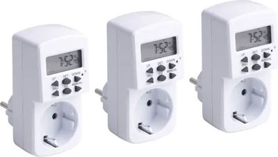 Three white digital timers with electrical outlets are arranged diagonally against a white background.
