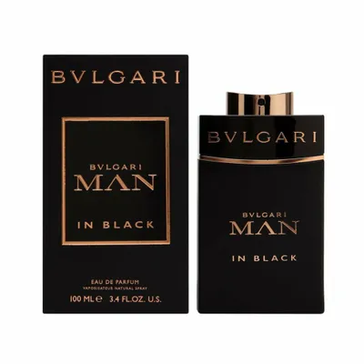 A black perfume bottle and its packaging are displayed against a white background.