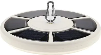 A solar-powered flag pole light with multiple solar panels arranged in a circular pattern.