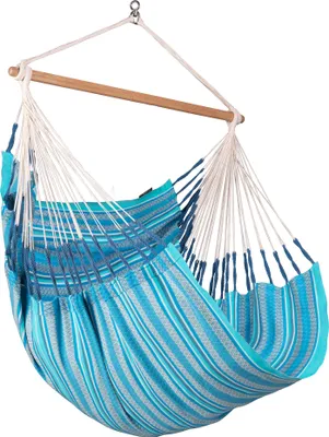 A hanging chair hammock suspended from a wooden bar.