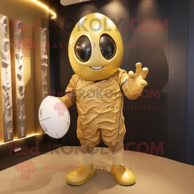 Productafbeelding van Gouden rugbybal mascotte REDBROKOLY kostuum karakter gekleed met een playsuit en schoenveters