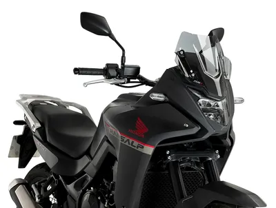 Imagen del producto de Cúpula Puig deportiva, color ahumado claro, para Honda Transalp