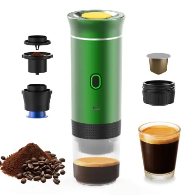 A green portable coffee maker with various accessories and a cup of coffee.