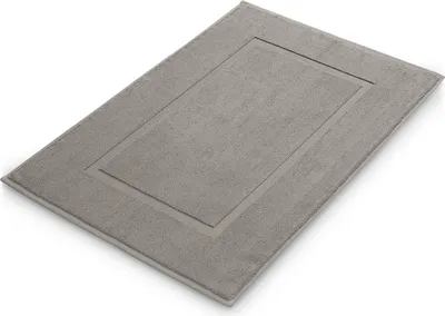 A single bath mat on a white background.
