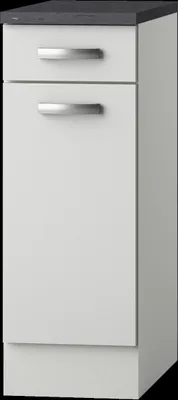 A white kitchen cabinet with a dark countertop and silver handles.
