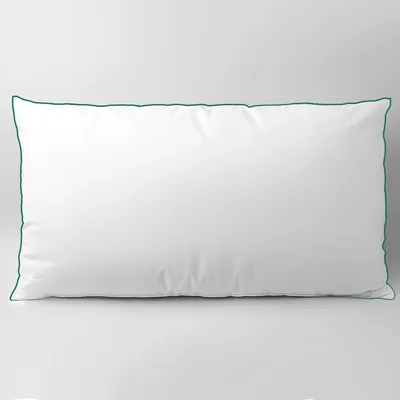 A white pillow with a dark green trim, presented on a plain white background.