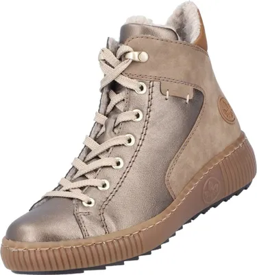 Auf dem Bild ist ein bronzefarbener Stiefel abgebildet der von der rechten Seite aus betrachtet wird. Der Stiefel hat eine glänzende Oberfläche und ein auffälliges Design mit verschiedenen Strukturen.