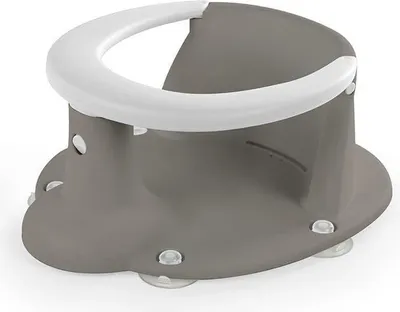 A gray baby bath seat with a white rim and clear suction cups on the bottom, shown on a white background.