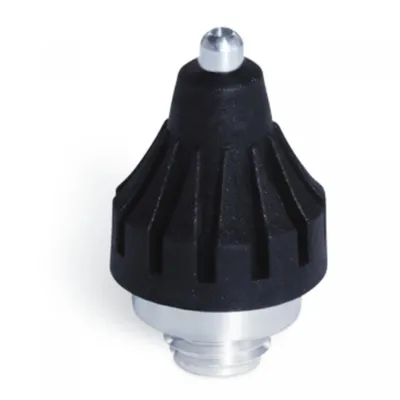 A close-up studio shot of a black and silver glue nozzle on a white background.