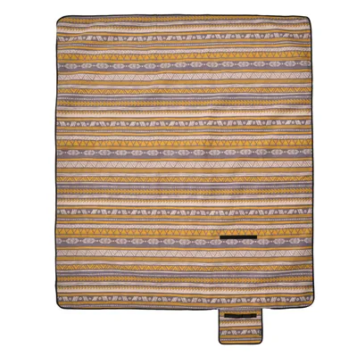 A folded picnic blanket with a geometric pattern.