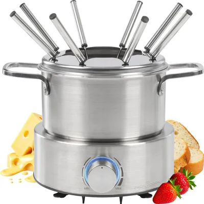 A stainless steel electric fondue set with a knob on the base, surrounded by cheese, bread, and strawberries.