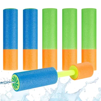 Several foam water guns are lined up, with one in the foreground firing a stream of water.