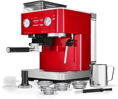 A red Kitchenaid espresso machine with accessories on a white background.