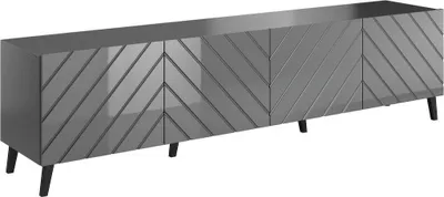 A long, low TV stand with a chevron pattern on the doors, shown from a slight angle against a white background.