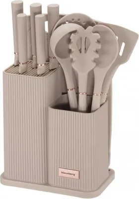 A set of kitchen knives and utensils in a holder.