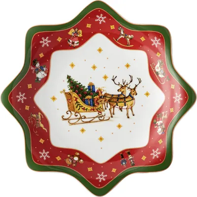 A star-shaped plate with a Christmas-themed illustration of a sleigh, reindeer, and Christmas tree.