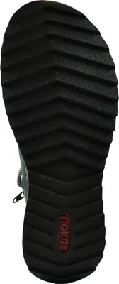 The sole of a shoe is shown against a white background.