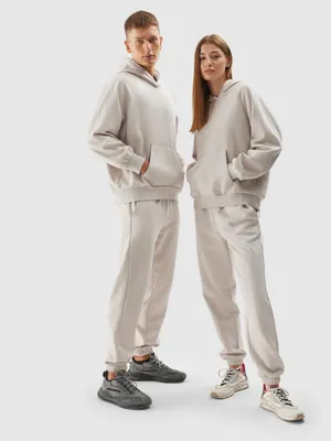 Zdjęcie produktu dla Spodnie dresowe 4F Unisex w kolorze beżowym, rozmiar L – wygodne i uniwersalne