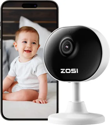 A baby is shown on a smartphone screen next to a ZOSI security camera.