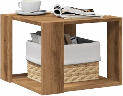 A wooden side table with a basket and books inside.