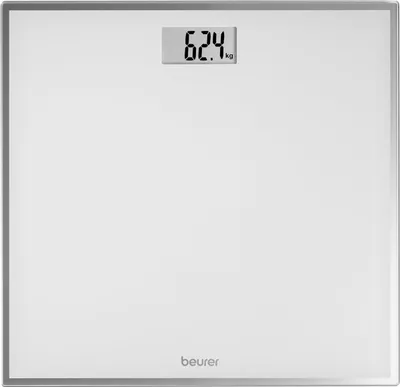 A white digital scale with a silver frame is shown against a white background. The scale displays a weight of 62.4 kg.