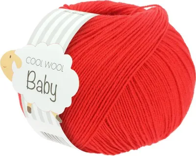 A ball of red yarn with a product label attached.