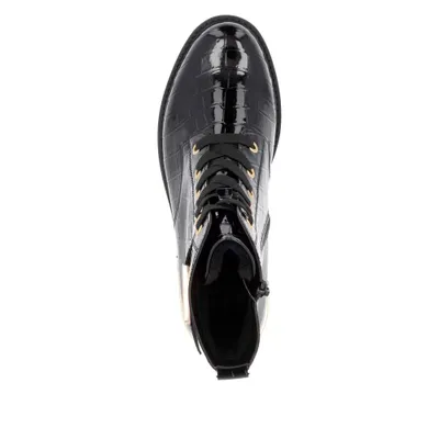 A top-down view of a black lace-up boot.