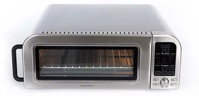 A stainless steel toaster oven with a digital display and control panel.