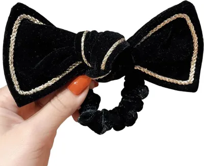 Immagine prodotto di Gomma Vintage Nera per Capelli - Elegante e di Alta Qualità KP19580