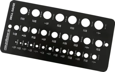 A black drill gauge with various sized holes and measurements printed on it.