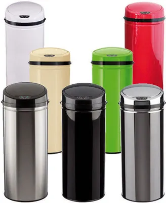 A collection of various colored trash cans arranged in a studio setting.