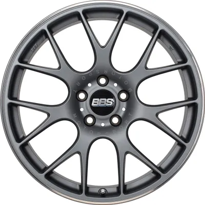 A close-up, studio shot of a single car wheel against a white background.